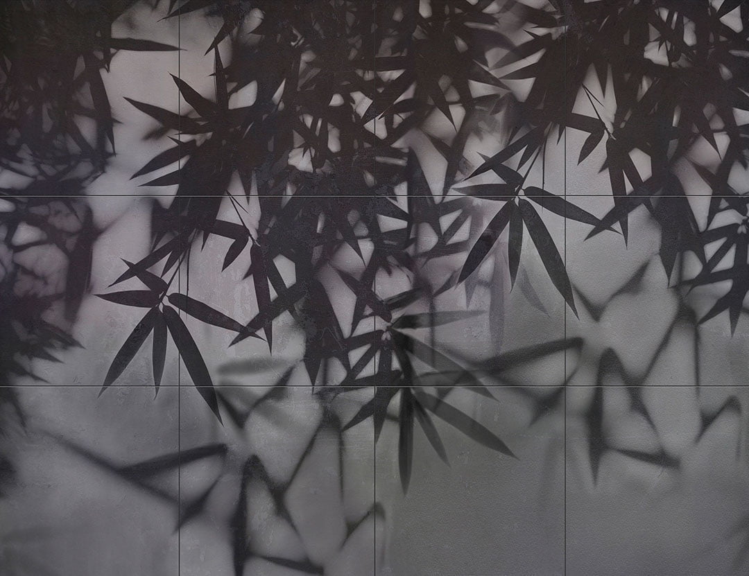 Dark palm leaves on a tile wall mural