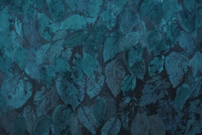 Nature wall mural with dark blue hand-drawn imprints of leaves