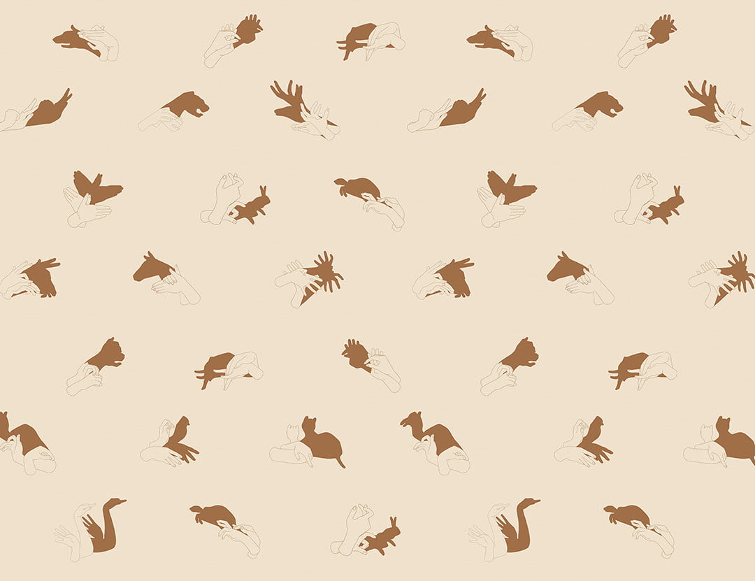 Patterned interactive peachy wall mural with hand shadow signs