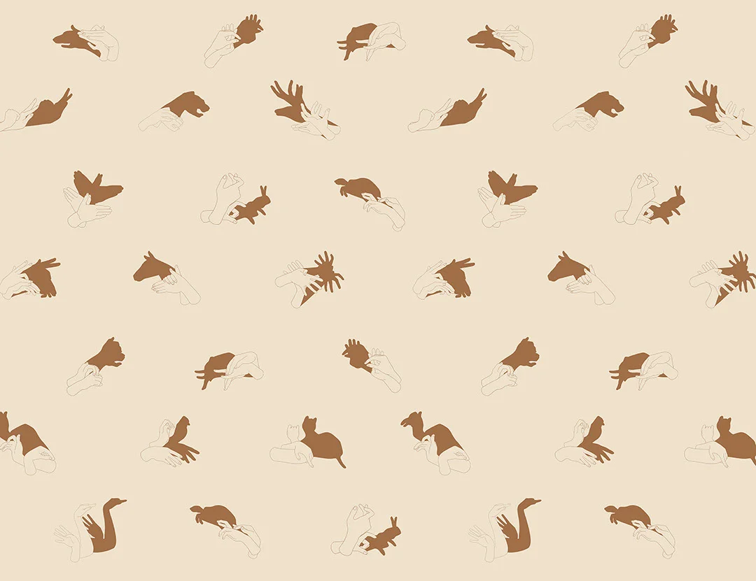 Patterned interactive peachy wall mural with hand shadow signs