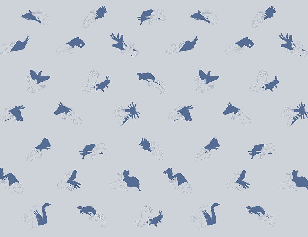 Patterned interactive blue wall mural with hand shadow signs