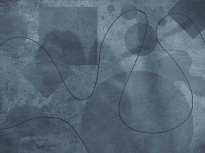 Geometric abstract shapes on a textured blue background wall mural