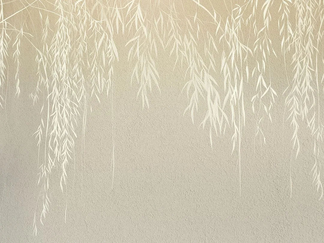 Wall mural fragile white branches with leaves on a light concrete wall